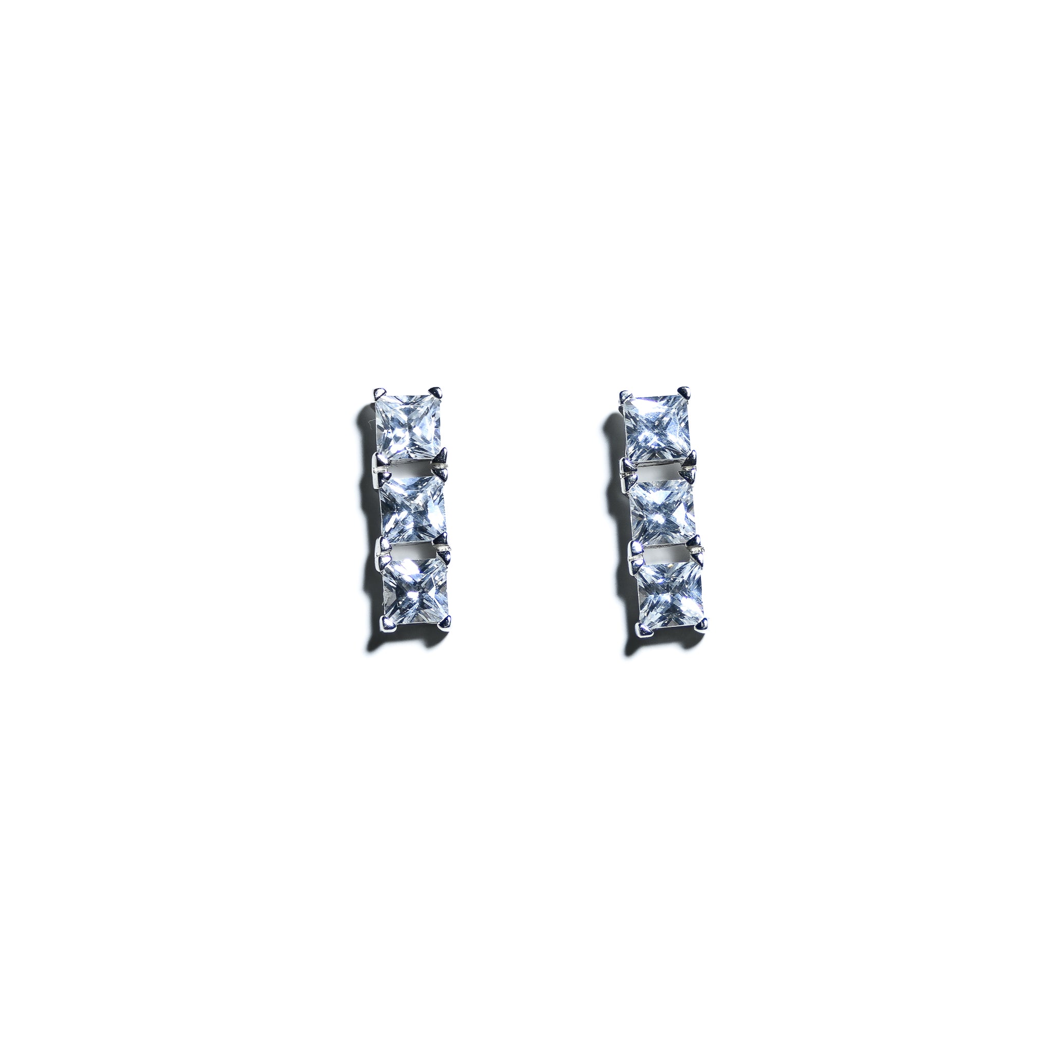 Stunning Three Stone Stud Earrings In Modern Setting
