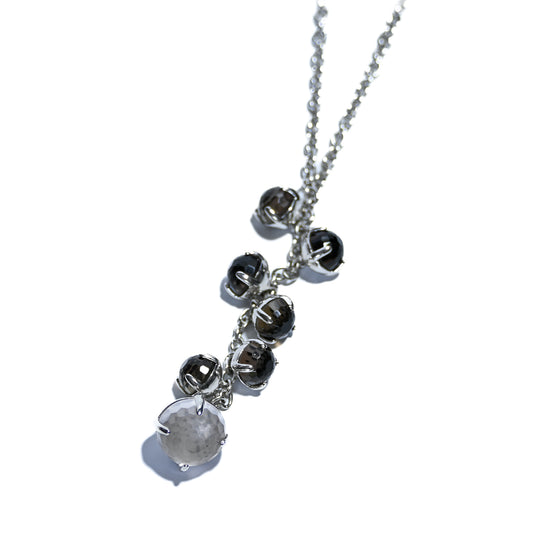 Sterling silver rhodium plated necklace with one pink moonstone and 6 Smokey Amethyst stones