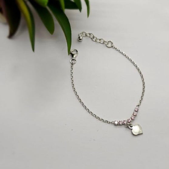 Sterling silver baby bracelet with pink cubic zirconia detail