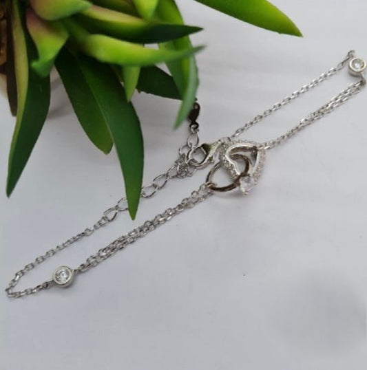 Heart and interlinked ring bracelet