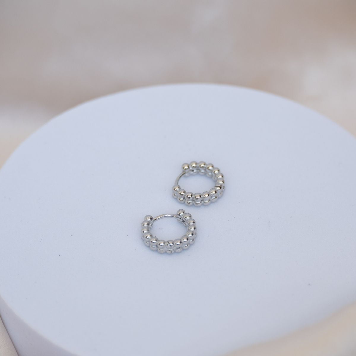 Double Bobble silver Huggy earrings