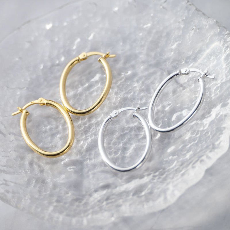 Oval silver hoops