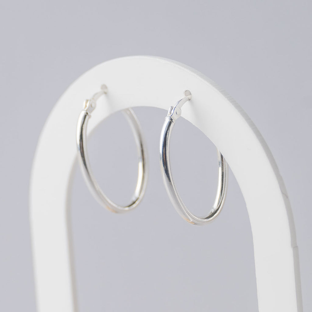 Oval silver hoops