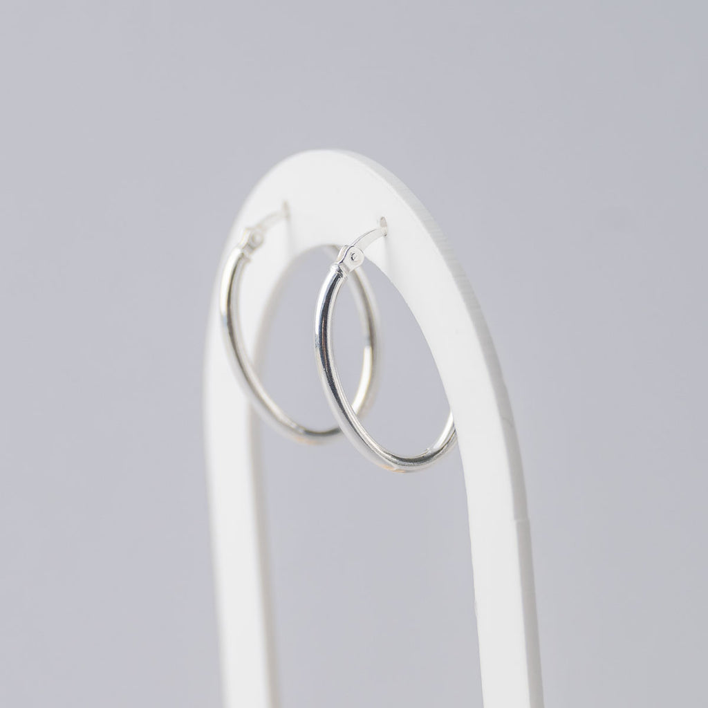 Oval silver hoops