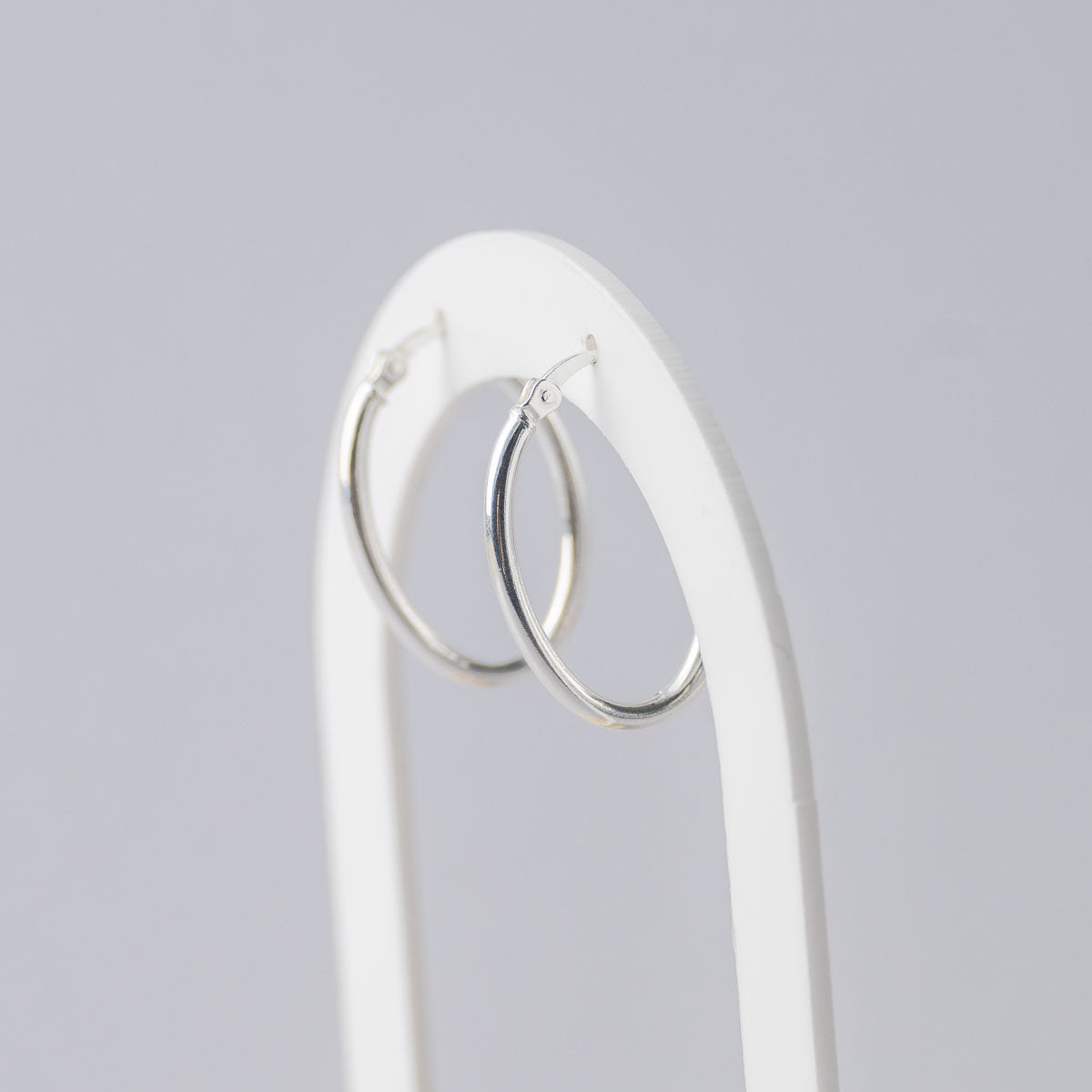 Oval silver hoops