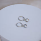 Huggy earrings with dangly cubic zirconia stones - Terciany 