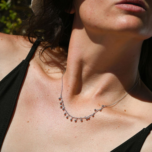 Necklace with lots of tiny silver drops