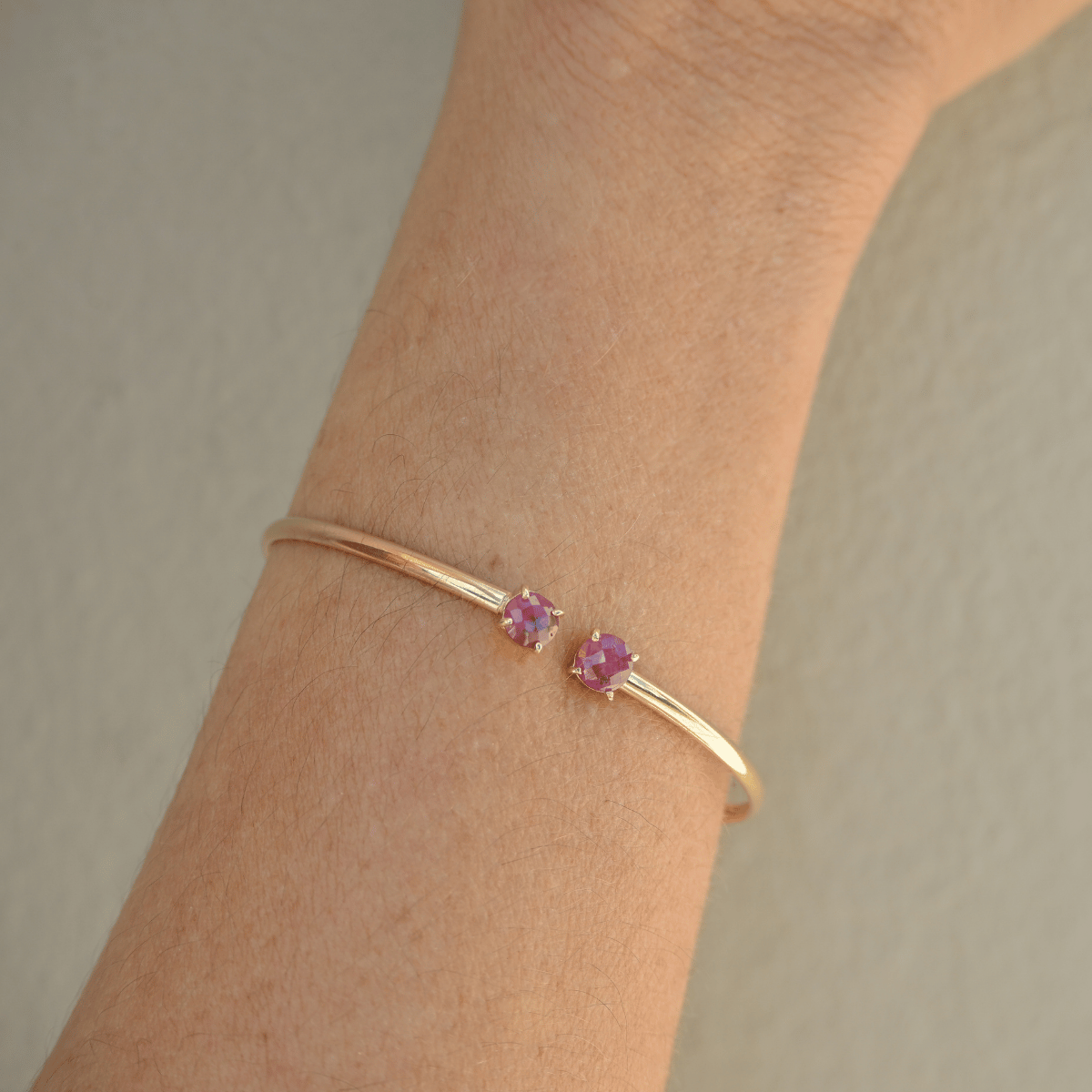 Gold cuff bangles with semi Precious stone ends
