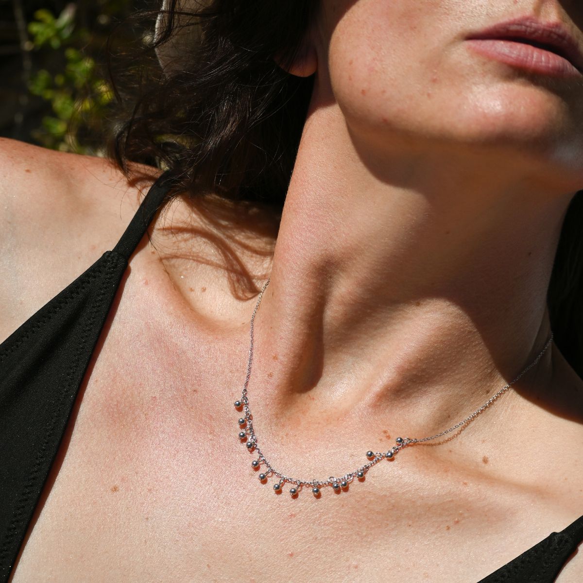 Necklace with lots of tiny silver drops