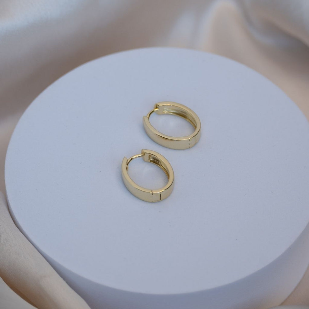 Gold Solid Oval huggy earrings