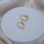 Gold Solid Oval huggy earrings - Terciany 