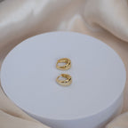 Gold teardrop Huggy earrings - Terciany 