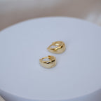 Gold teardrop Huggy earrings - Terciany 