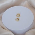Gold teardrop Huggy earrings - Terciany 