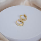 Gold Solid Oval huggy earrings - Terciany 