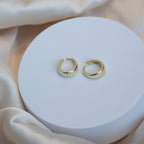 Gold teardrop Huggy earrings - Terciany 