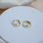 Gold teardrop Huggy earrings - Terciany 