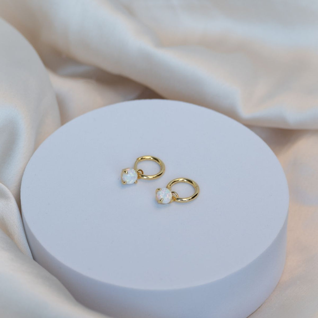 Gold huggy earring with Opal charm