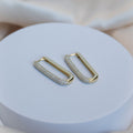 Statement Gold paperclip Huggy earrings with Bling - Terciany 