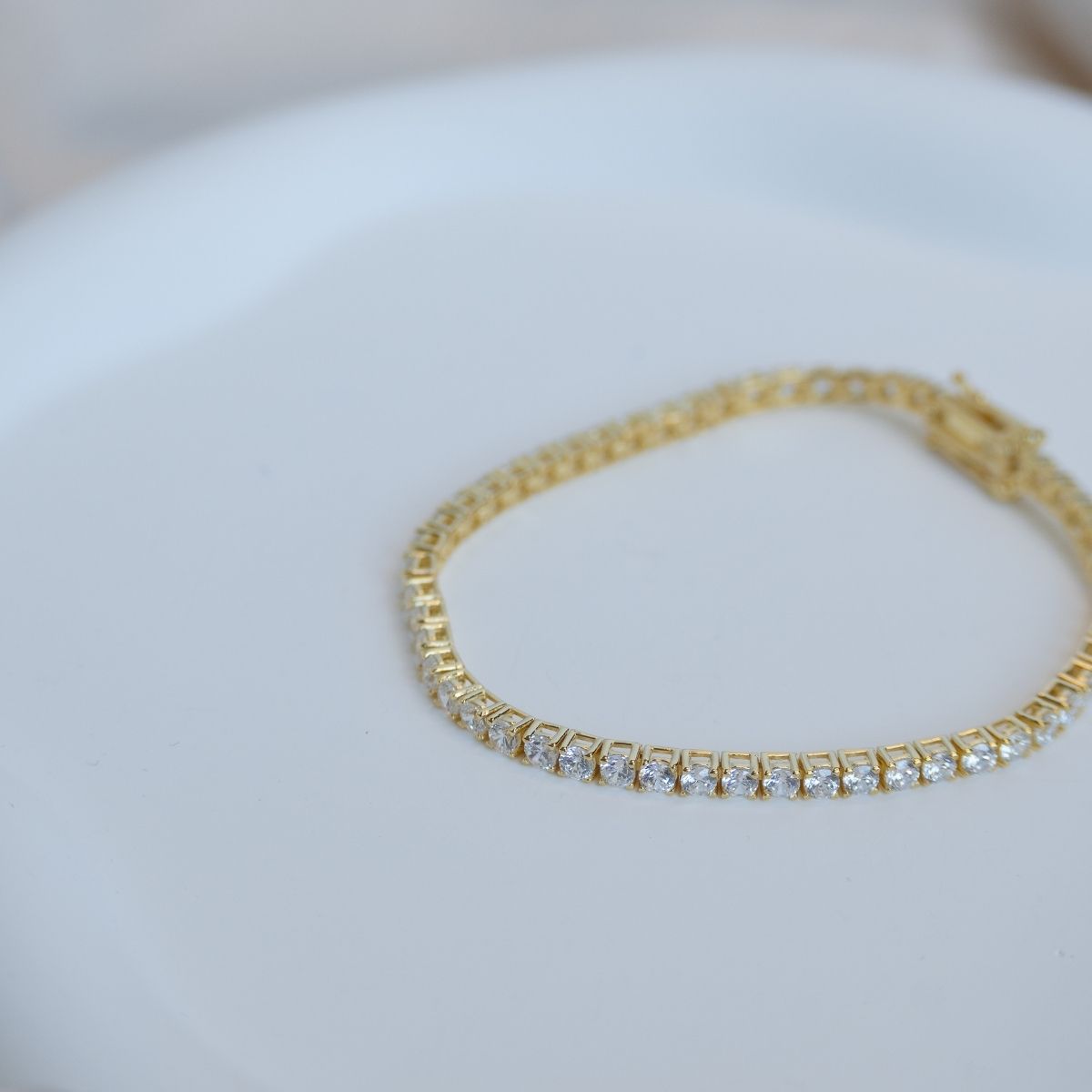 Gold tennis bracelet with clear zirconia stones - Terciany 