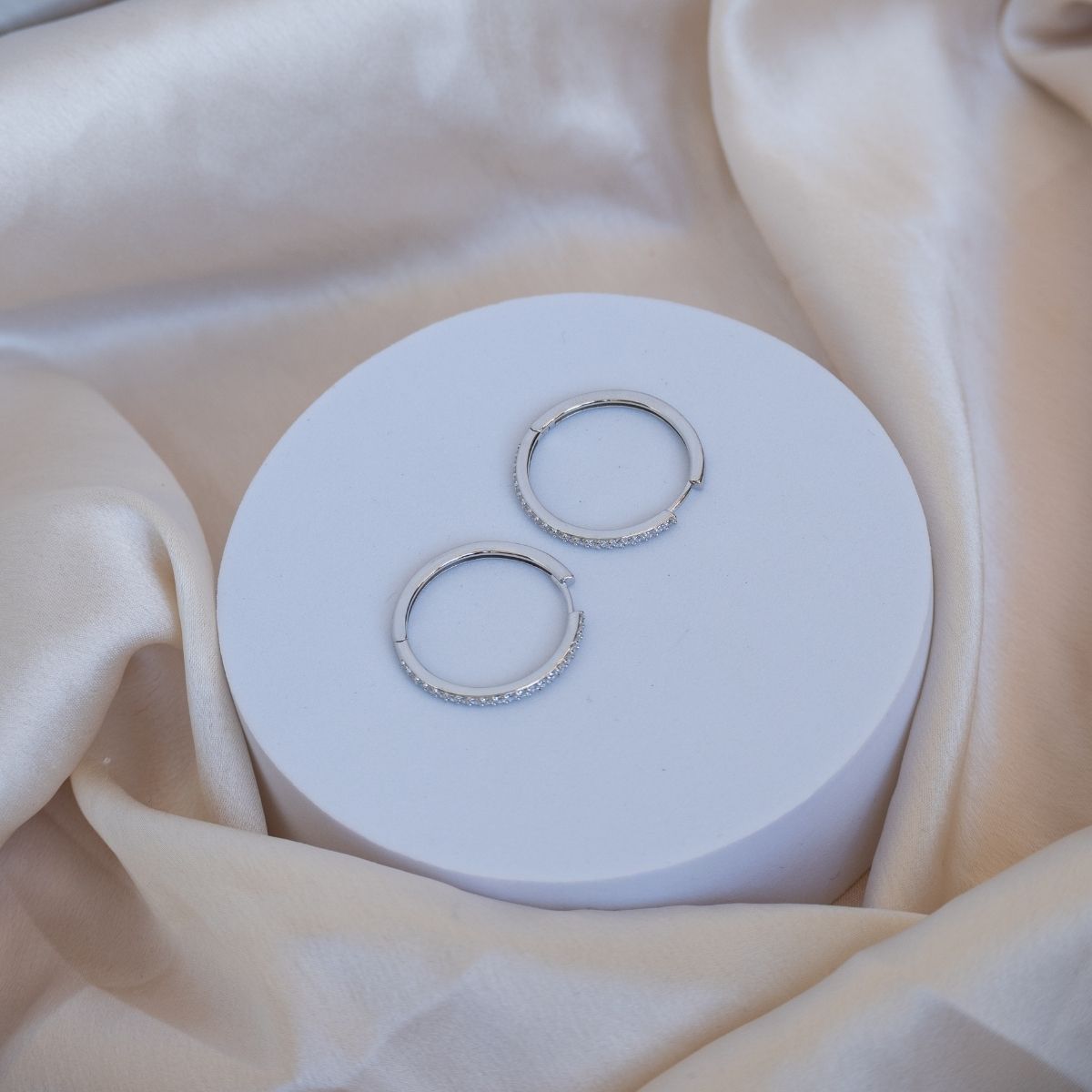 Sterling silver huggy earrings with Zirconia Pave