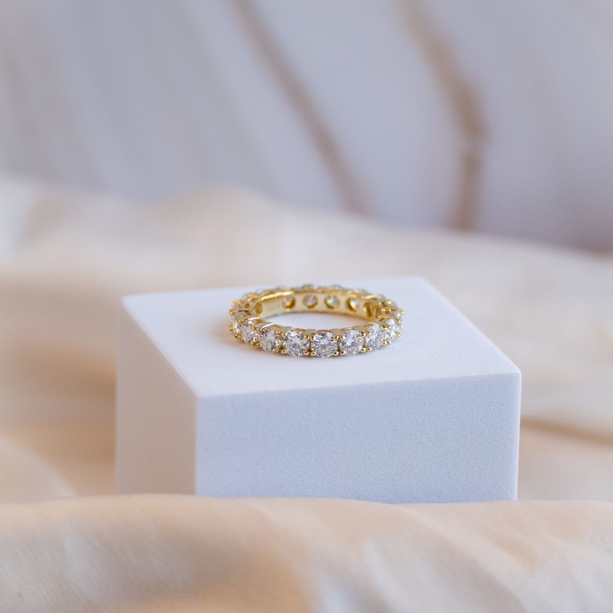 Gold Eternity ring with 4mm Moissanite stones (with GRA Certificate)