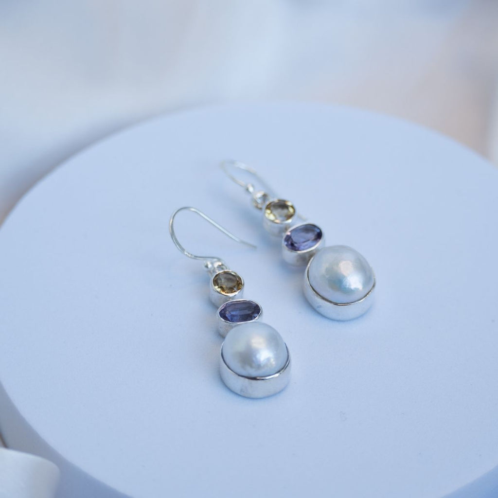 Three drop earrings with Amethyst and Citrine and a freshwater pearl in the drop
