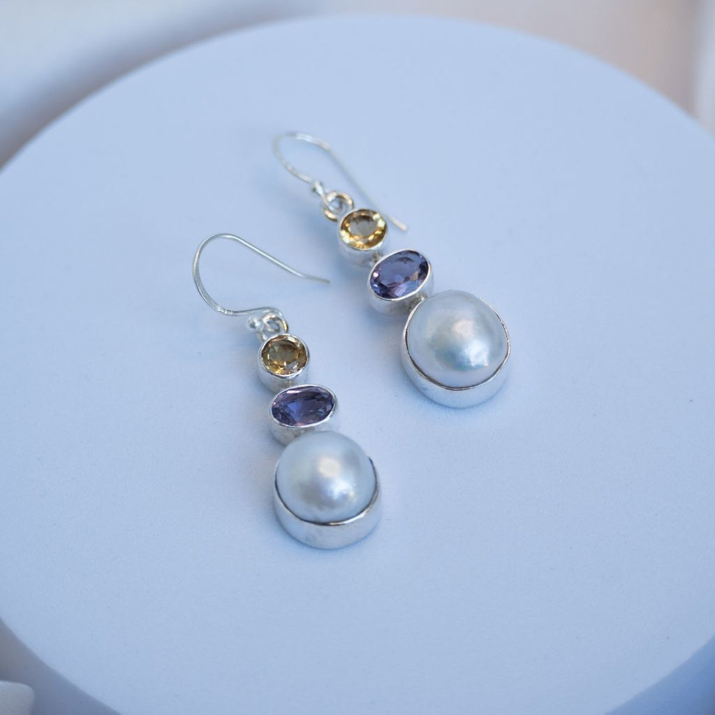 Three drop earrings with Amethyst and Citrine and a freshwater pearl in the drop