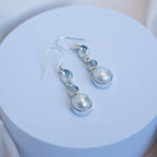 Three drop earrings with blue topaz, moonstone and freshwater pearl drop