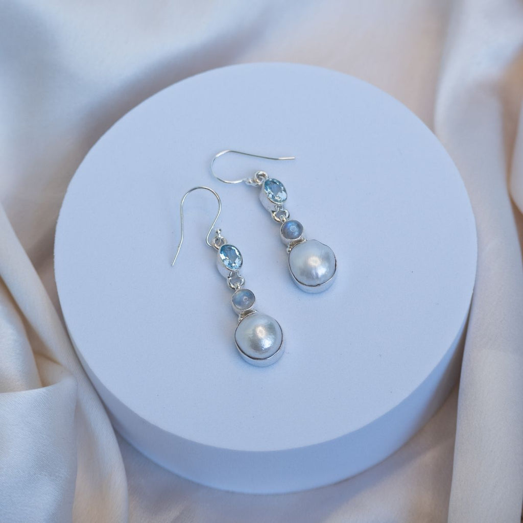 Three drop earrings with blue topaz, moonstone and freshwater pearl drop