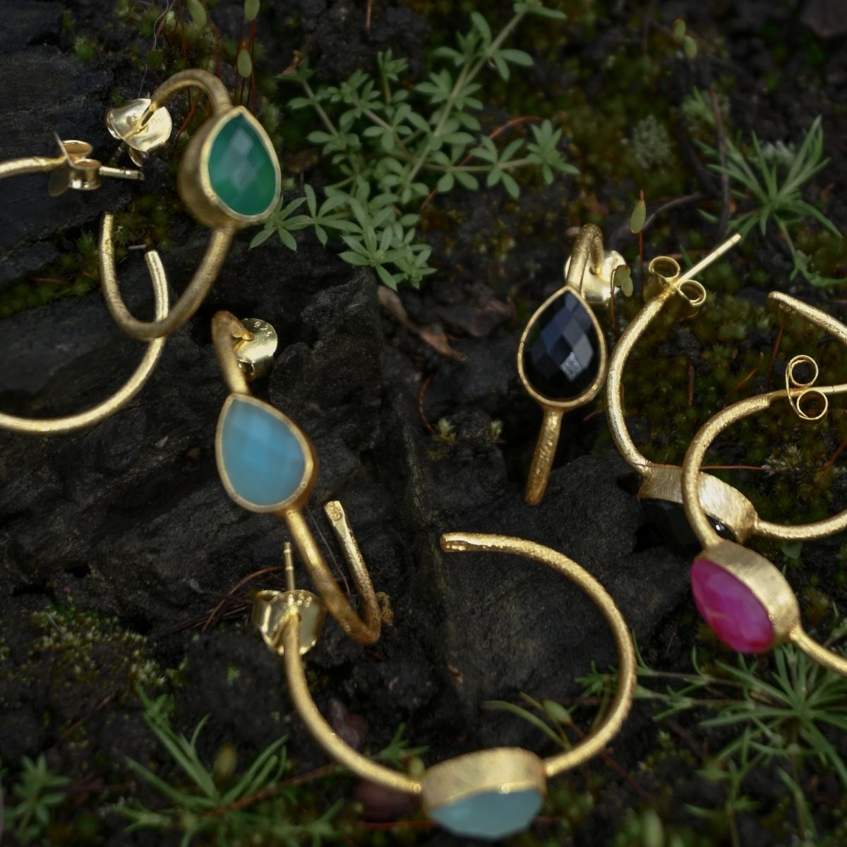 Rose Quarts teardrop stones in golden hoop earrings