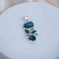 Pendant with a cluster of Raw Blue apatite and other light semi precious stones