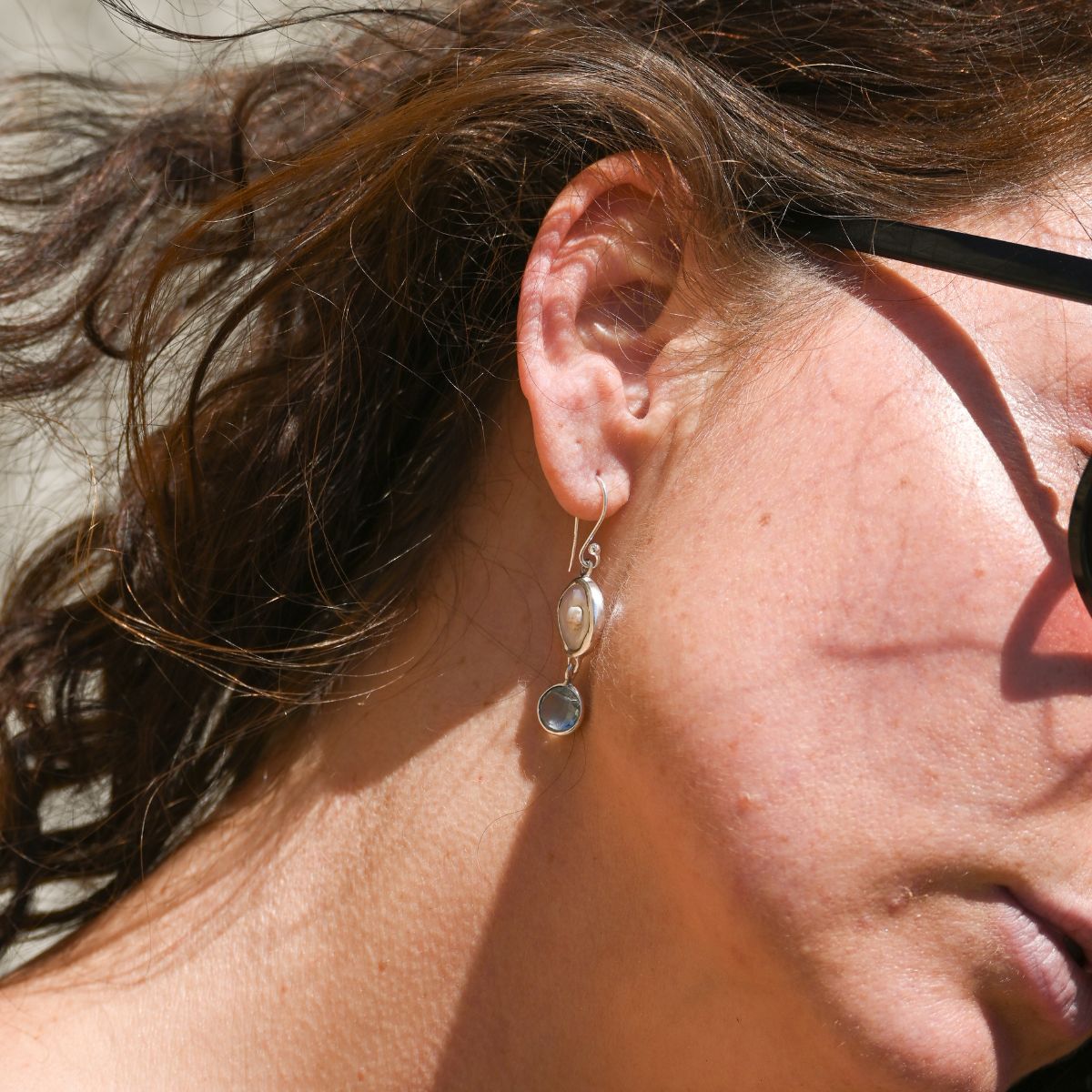 Coin pearl drop earrings with blue Topaz drop