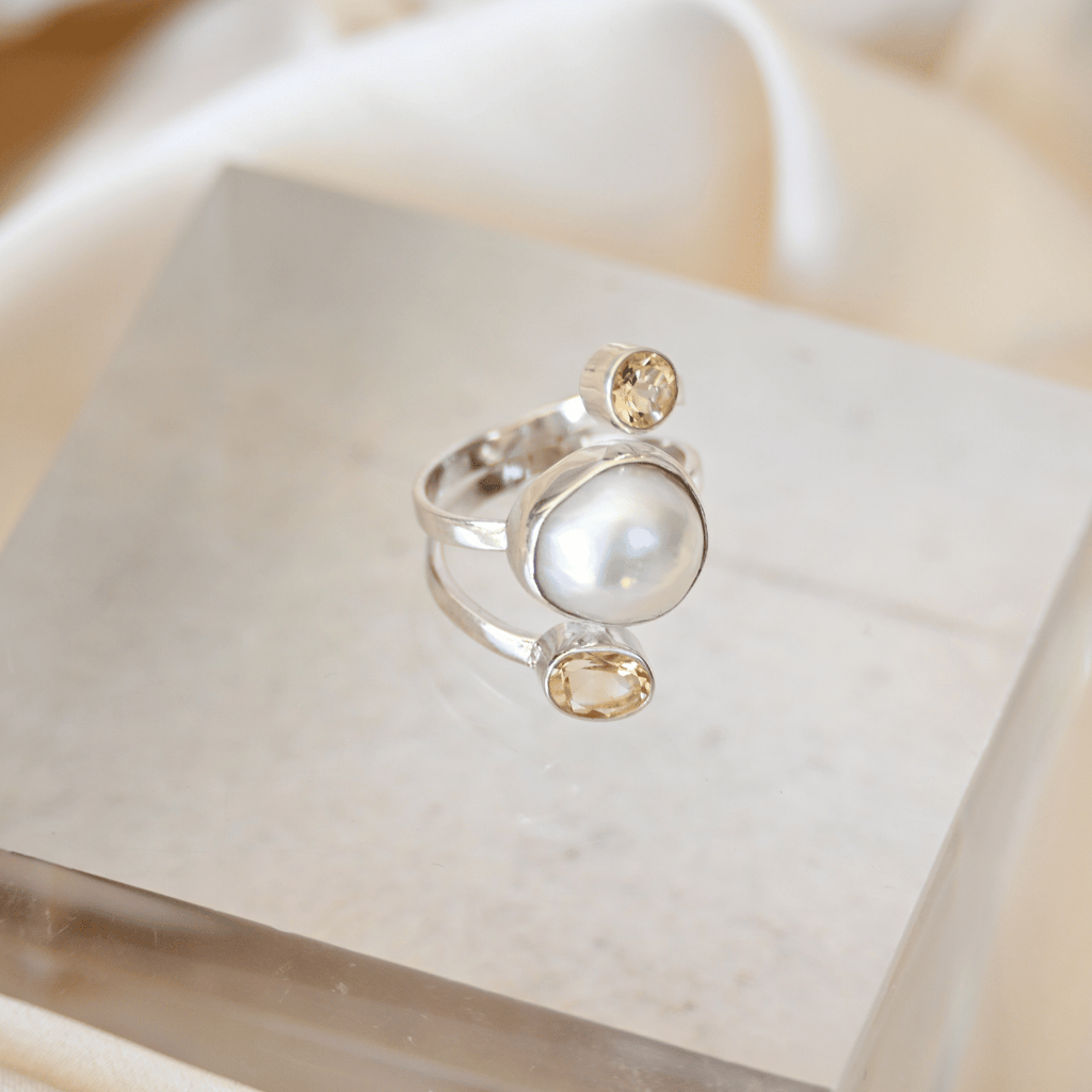 Freshwater pearl ring with two citrine semi precious stones