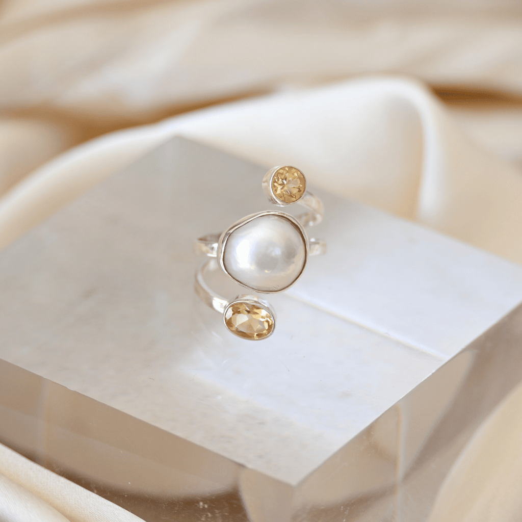 Freshwater pearl ring with two citrine semi precious stones