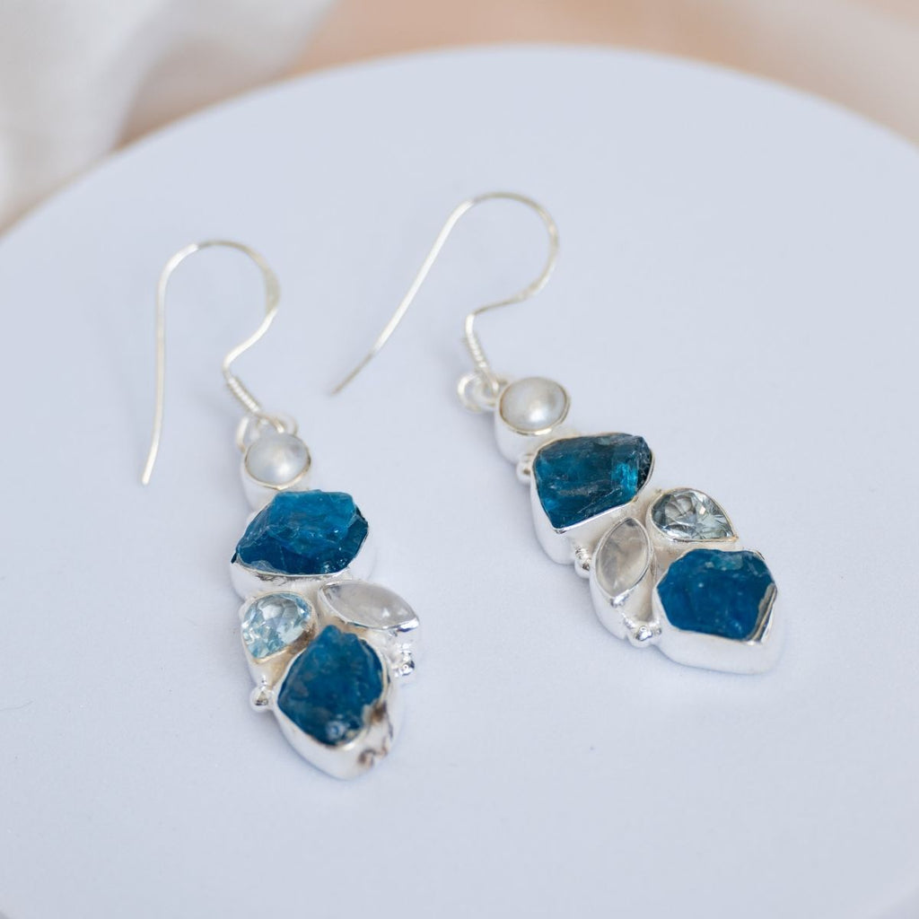 Blue Apatite, moonstone, blue topaz and a freshwater pearl drop earring