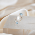 Sterling silver freshwater pearl ring with two blue topaz semi precious stones - Terciany 