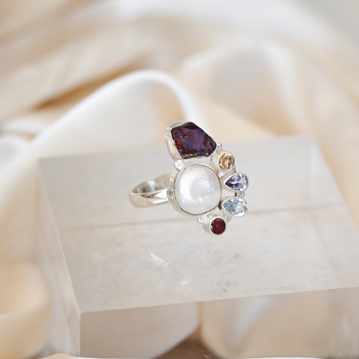 Freshwater pearl ring with five different semi precious stones