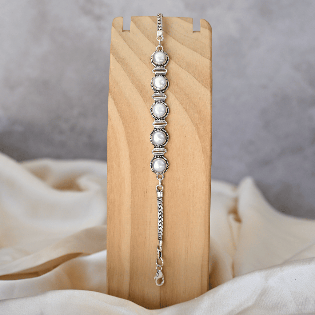 Five pearl bracelet with filigree tube setting