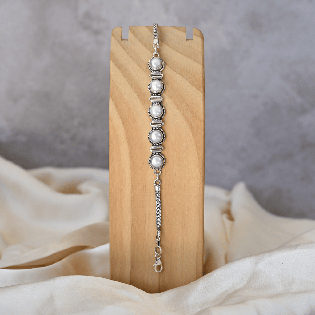 Five pearl bracelet with filigree tube setting