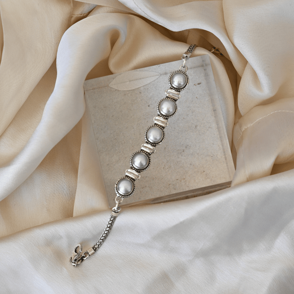Five pearl bracelet with filigree tube setting