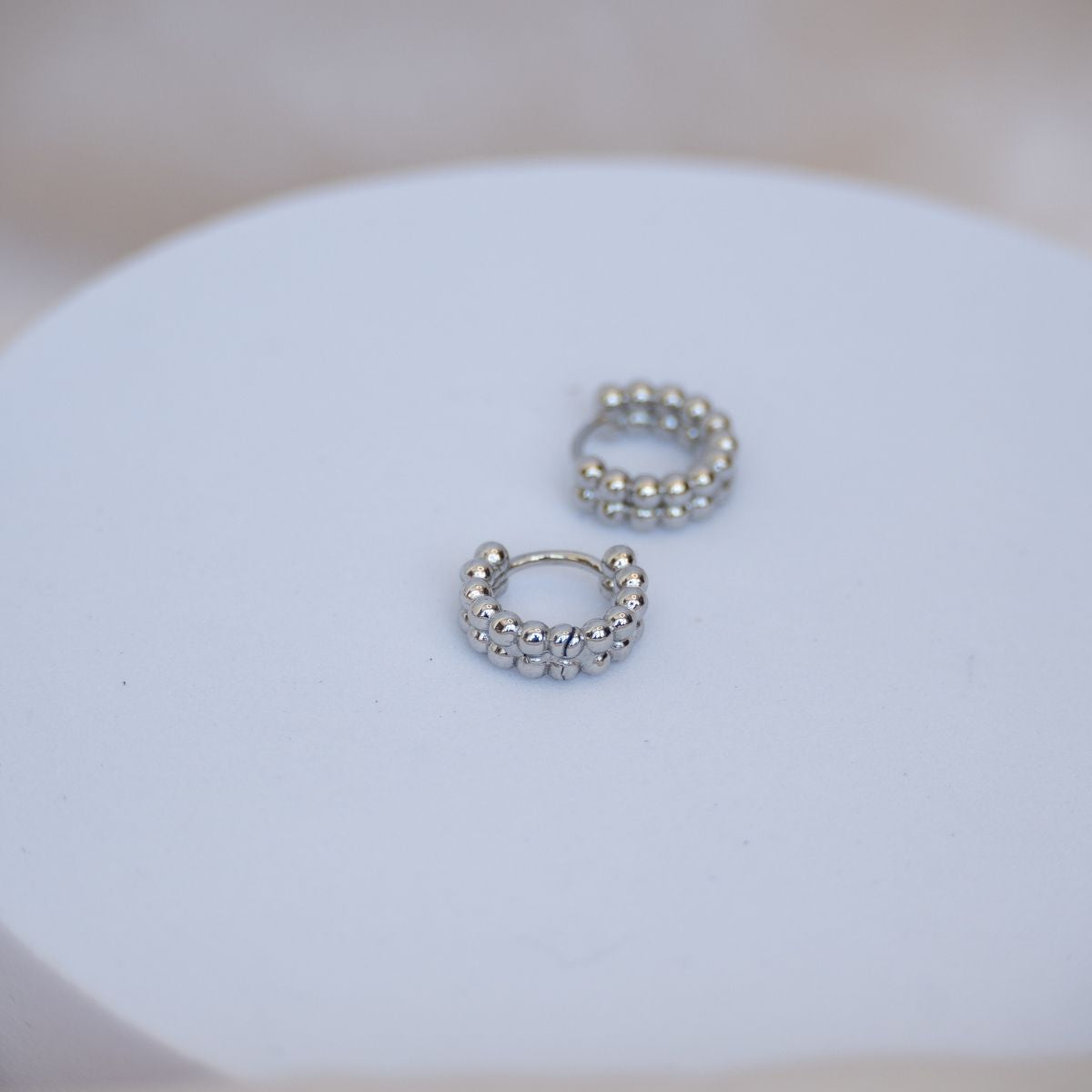 Double Bobble silver Huggy earrings