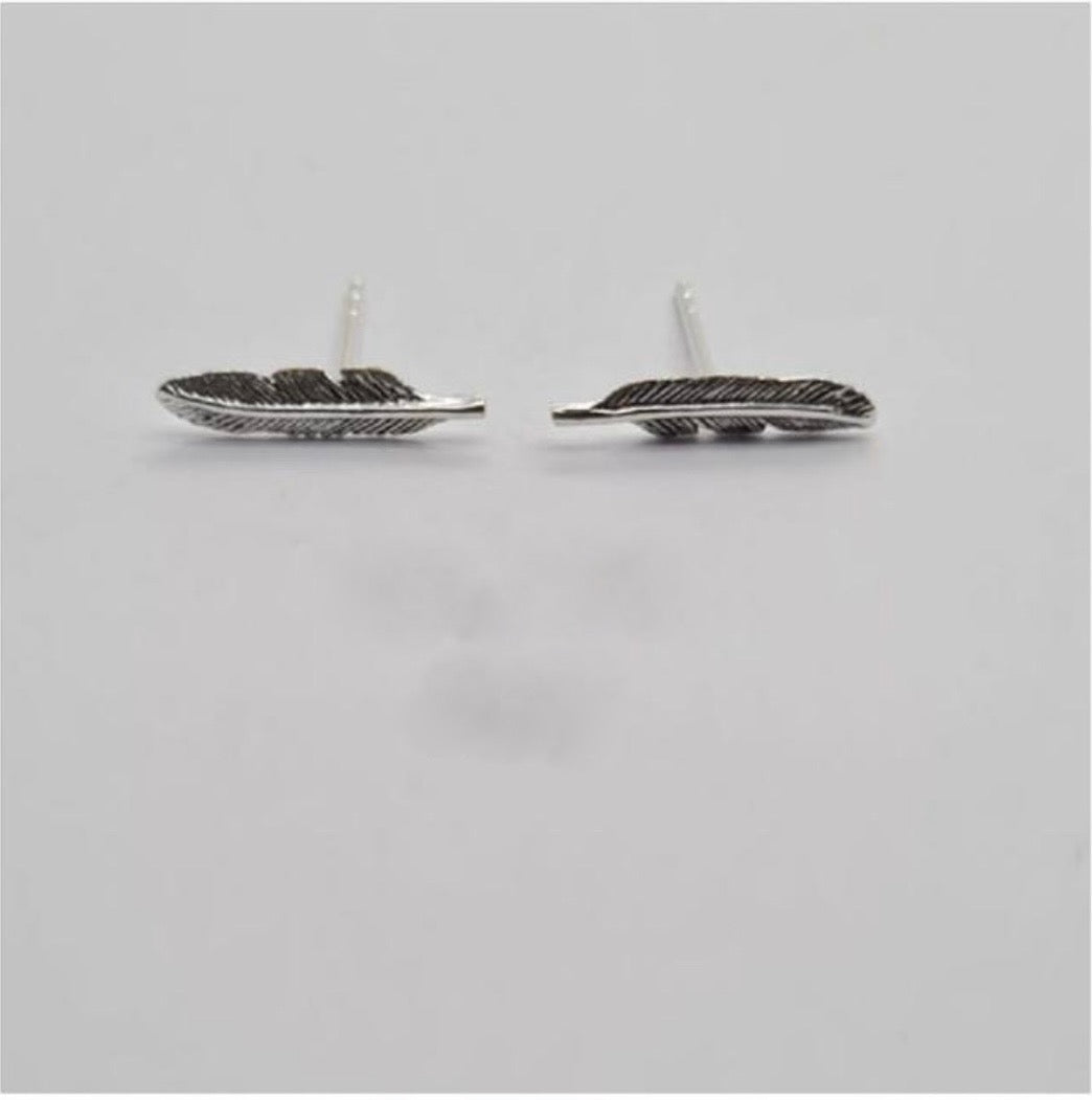 Feather studs