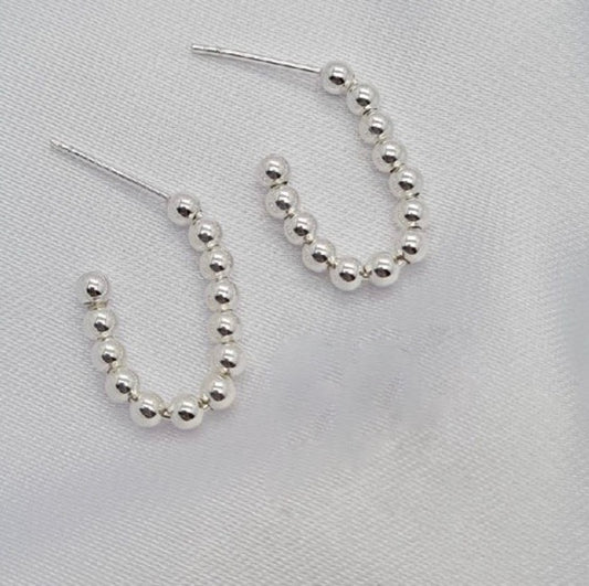 Oval ball hoop earrings